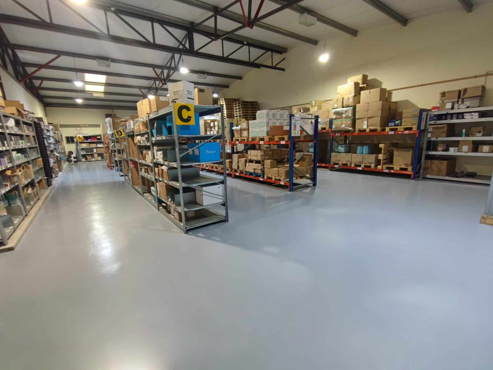 Slip-resistant, durable flooring for a hospital store area, ensuring safety and functionality.