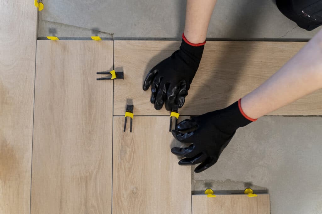 specialist flooring contractor installing bespoke commercial flooring solution on job site